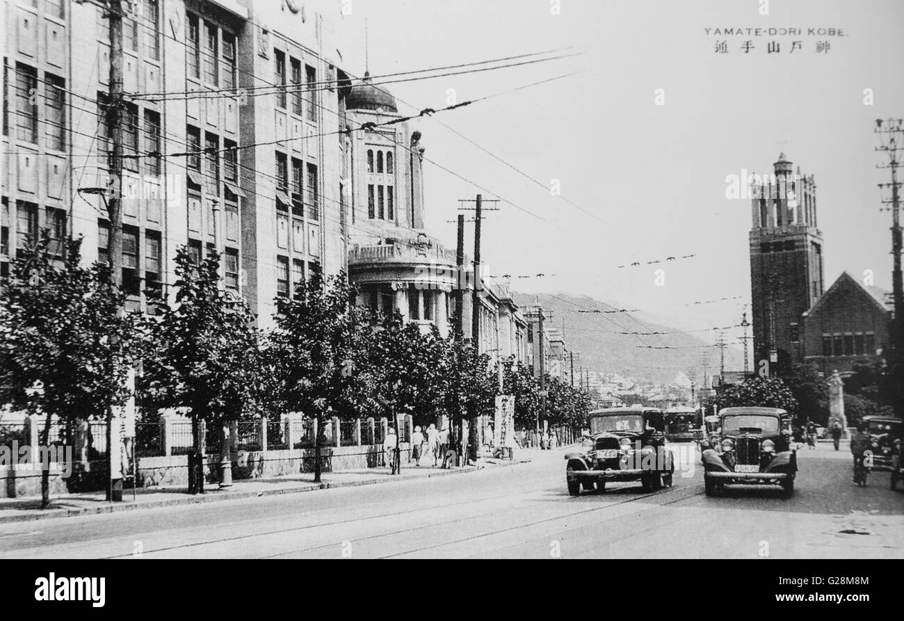Kobe Yamatedori street, Hyogo, Japan. c 1935. Showa 10. Stock Photo