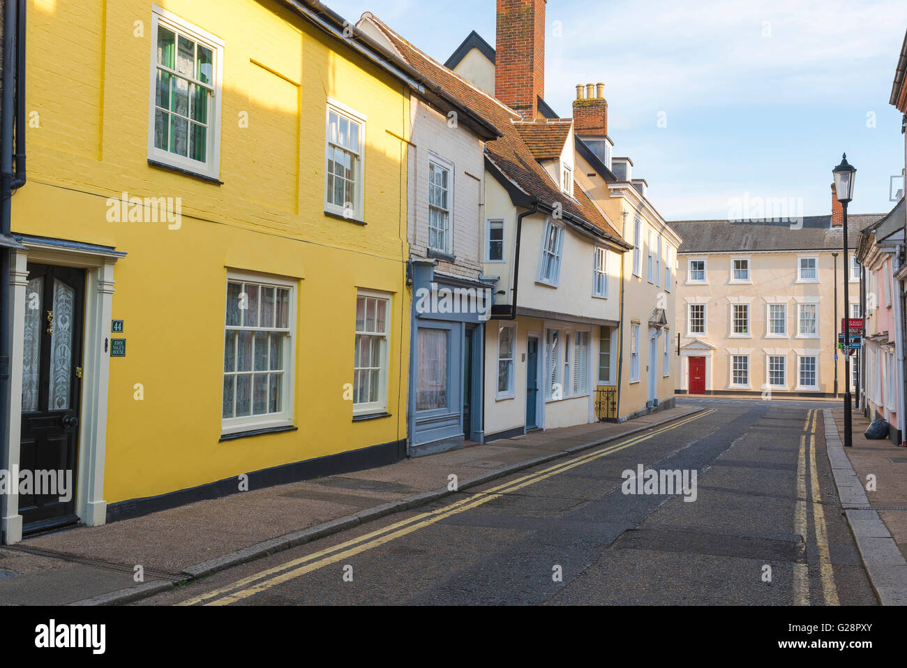 Suffolk UK architecture, view of a colourful row of medieval houses in