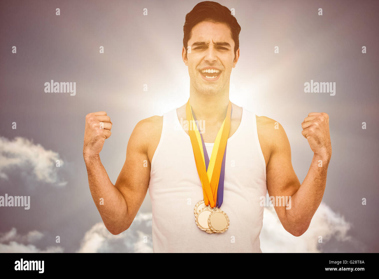 Composite image of athlete posing with gold medal after victory Stock ...