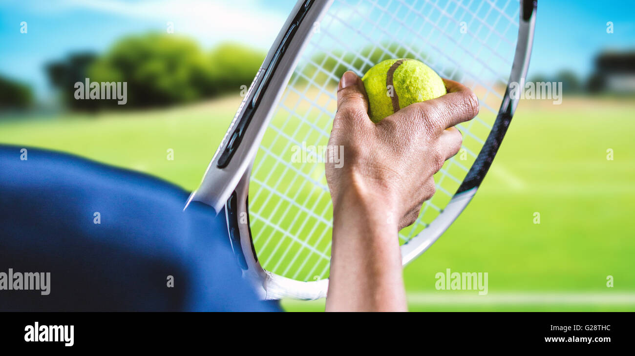 Composite image of tennis player holding a racquet ready to serve Stock Photo