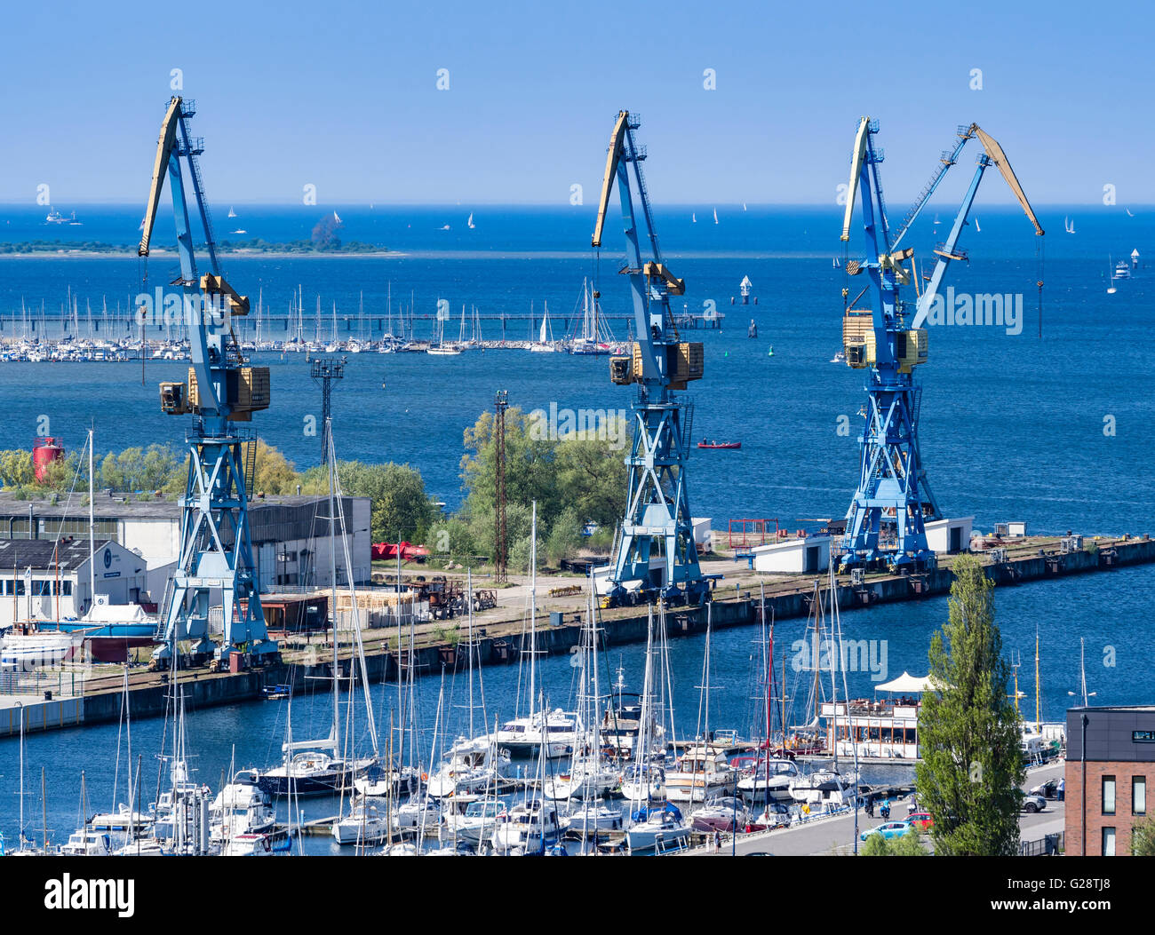 Cranes at the harbor, seen from platform of St. Georgen church, Wismar, Germany. Stock Photo
