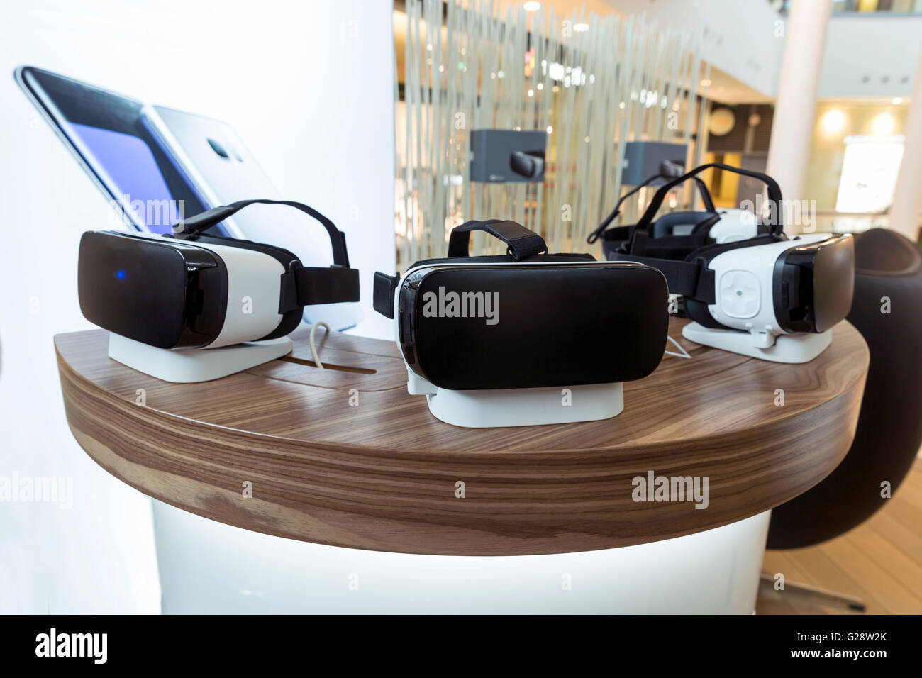Virtual reality (VR) headsets (glasses) on a table. VR is immersive multimedia or computer-simulated reality - a computer techno Stock Photo