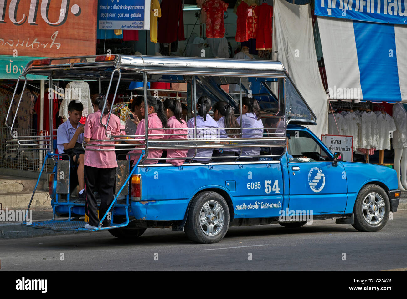 Fully loaded Thai songthaew public transport car. Thailand S. E. Asia