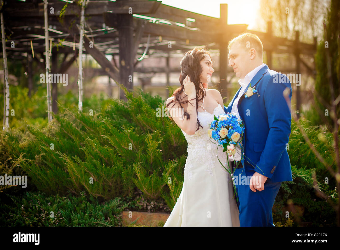 Happy bride and groom on their wedding summer Stock Photo - Alamy