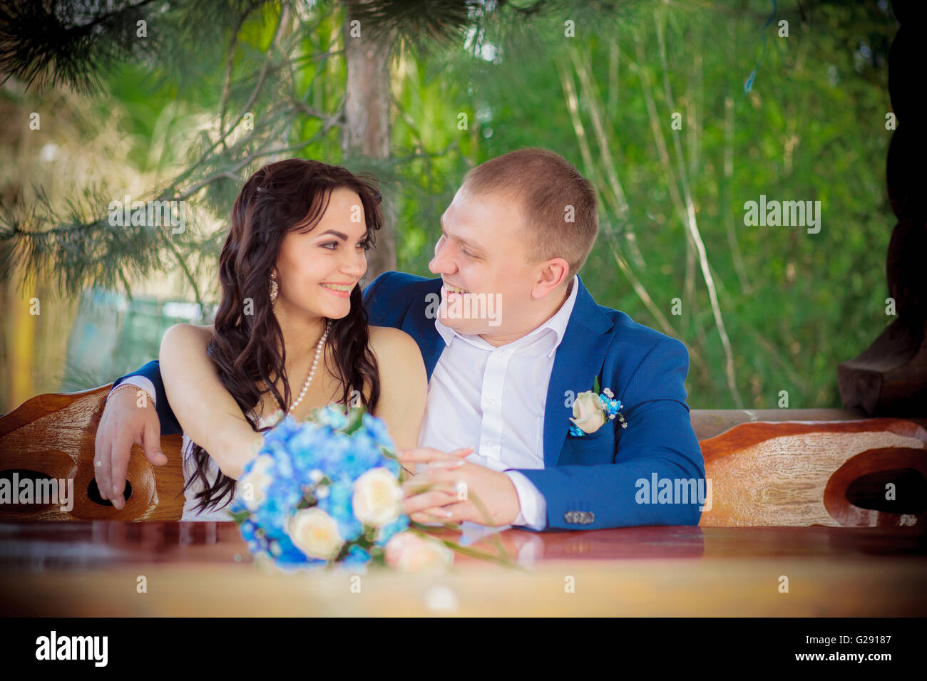 Happy bride and groom on their wedding summer Stock Photo - Alamy