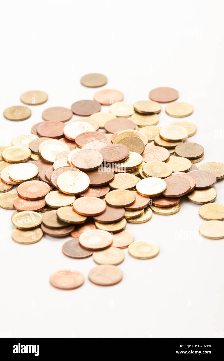 Portrait of bunch of coins on white background Stock Photo - Alamy