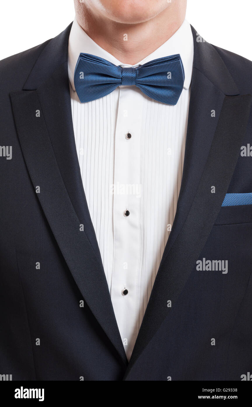 Closeup with elegant designer suit, white shirt, blue bow tie and Stock
