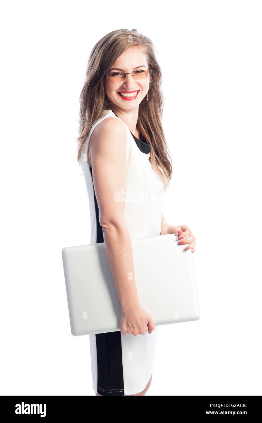 Happy business woman carrying a laptop on white background Stock Photo ...