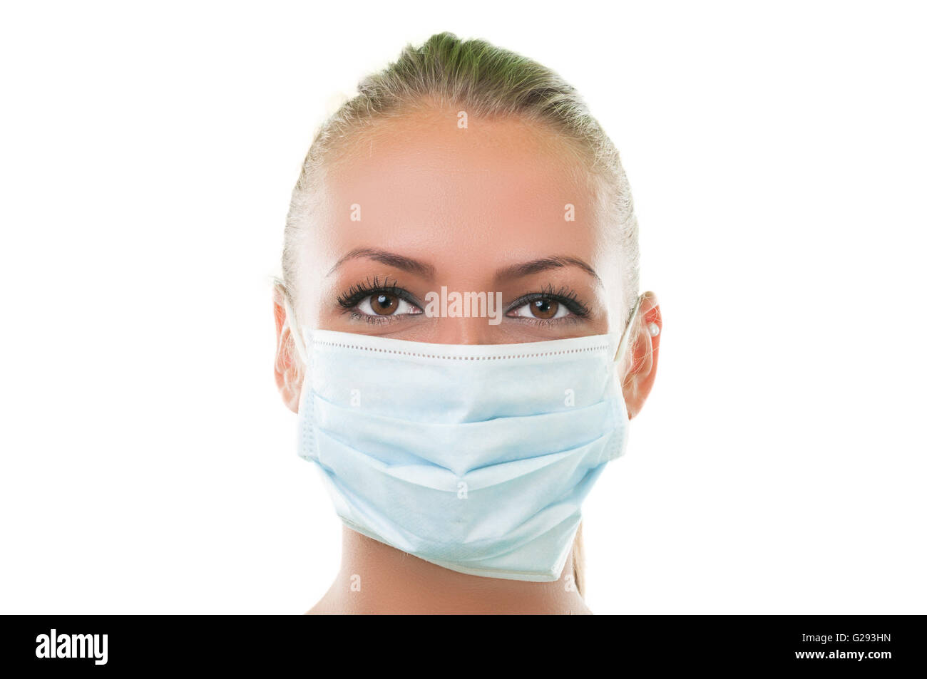 Face of a doctor woman wearing hospital mask with white background Stock Photo