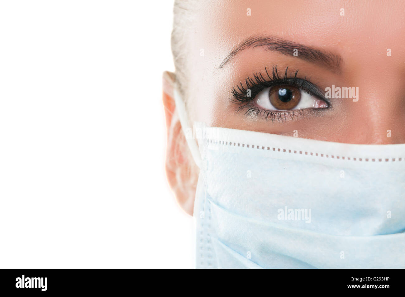 Close-up of eye and mask of doctor assistant isolated on white background Stock Photo