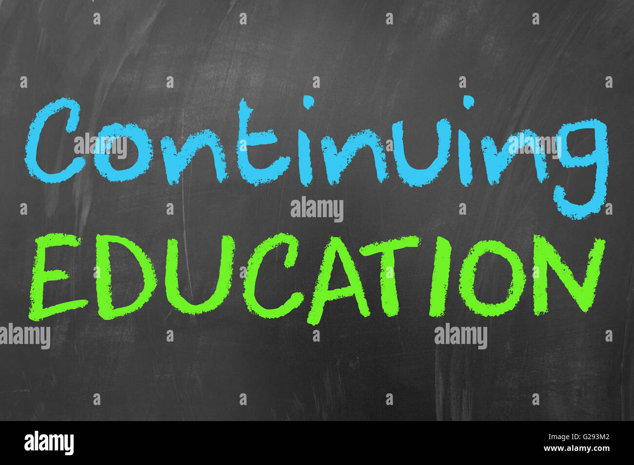 Continuing education concept on blackboard Stock Photo Alamy