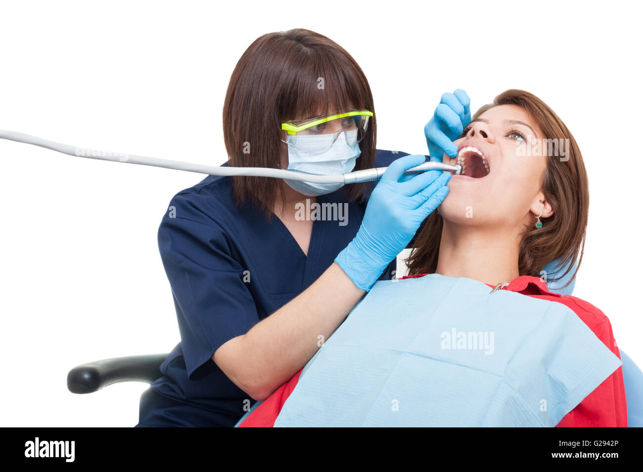 Professional dental drilling procedure on upper teeth in dentist office