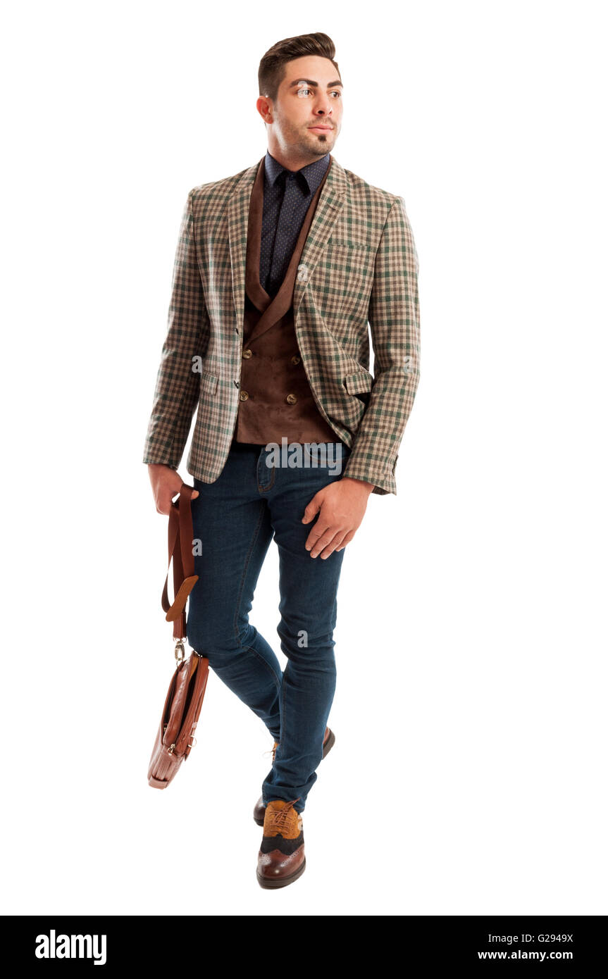 Casual and retro fashionable business man wearing plaid suit jacket and jeans Stock Photo