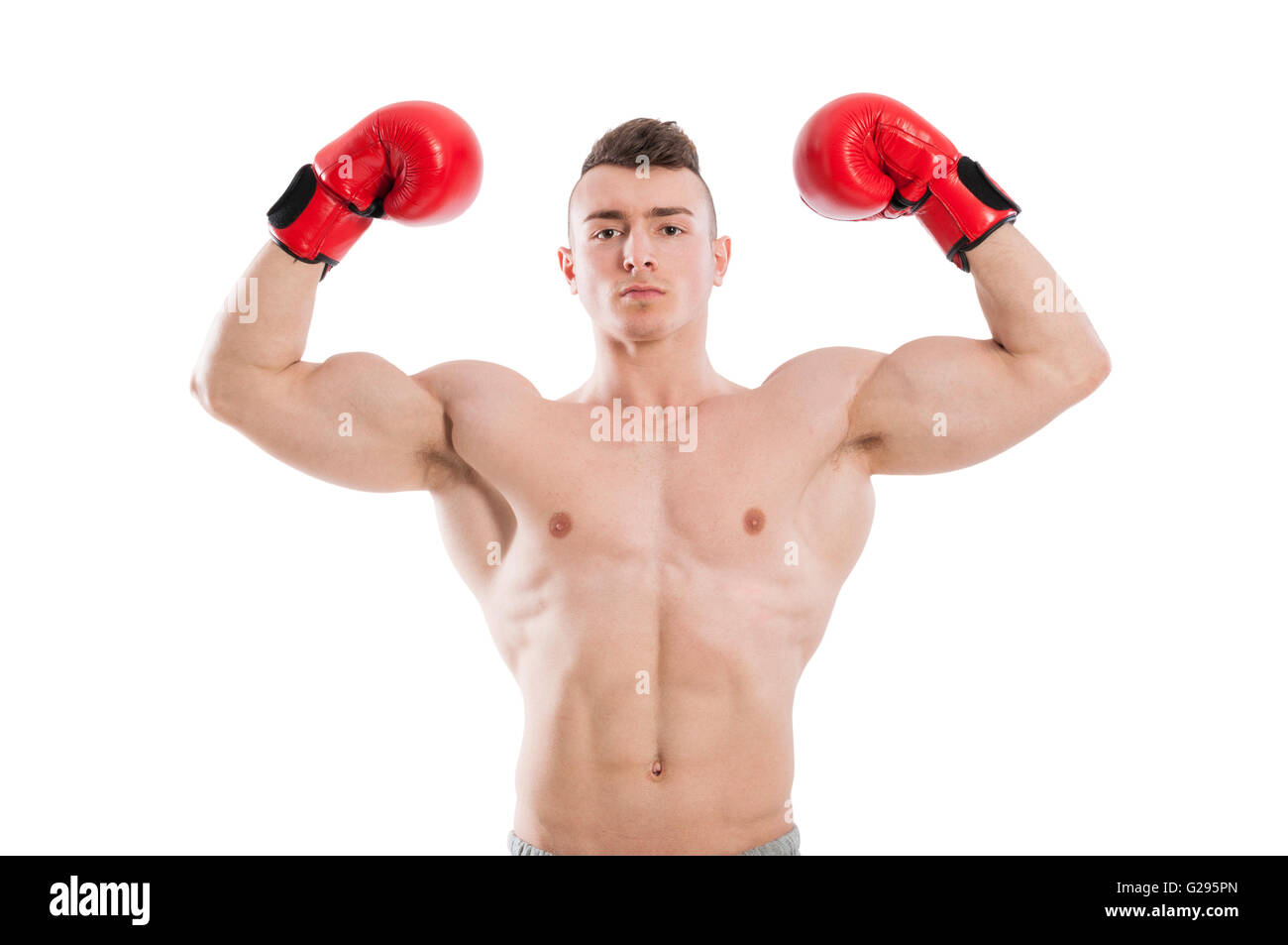 Boxer flexing biceps and wearing red boxing gloves on white background Stock Photo Alamy