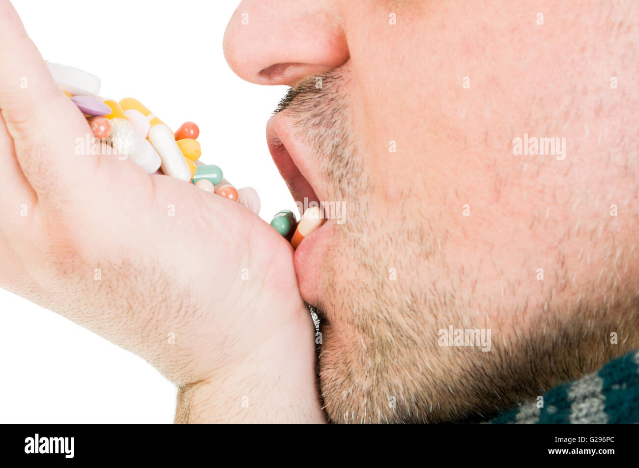man-taking-pills-as-a-medicine-abuse-or-addiction-concept-G296PC.jpg