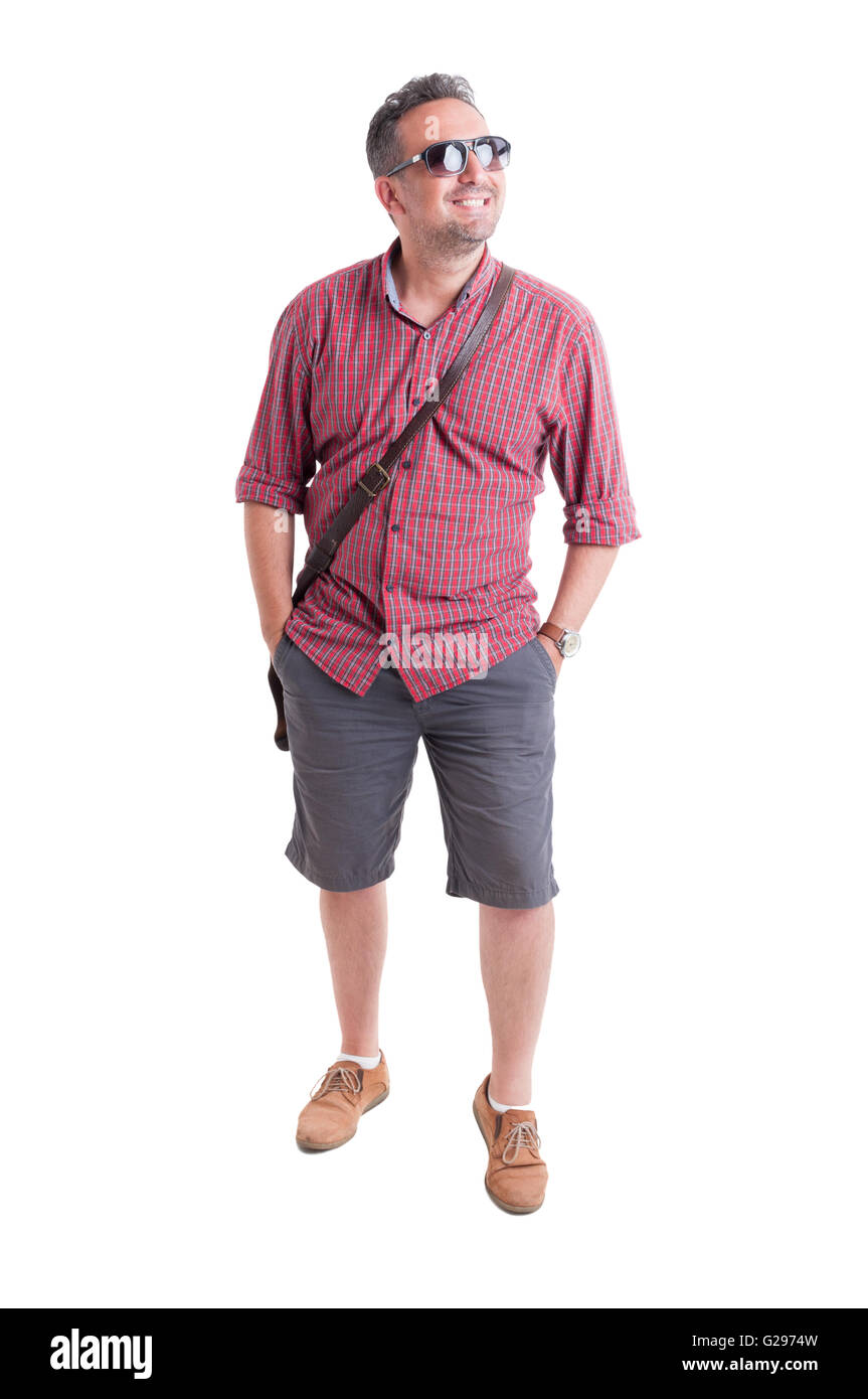 Handsome male model posing and wearing summer clothing and shades or sunglasses Stock Photo