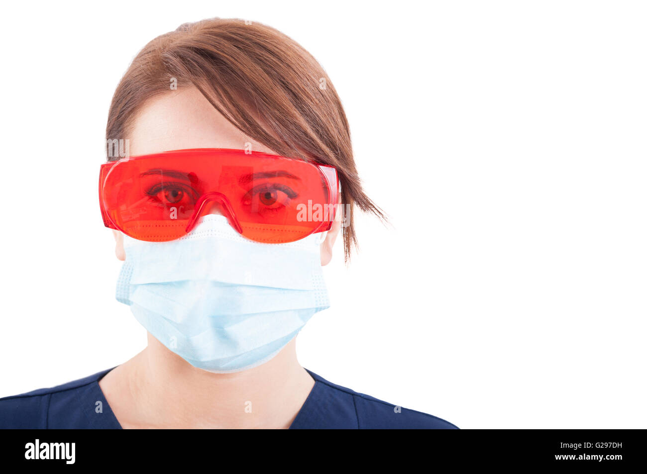 Portrait of dentist woman wearing mask and protective glasses isolated