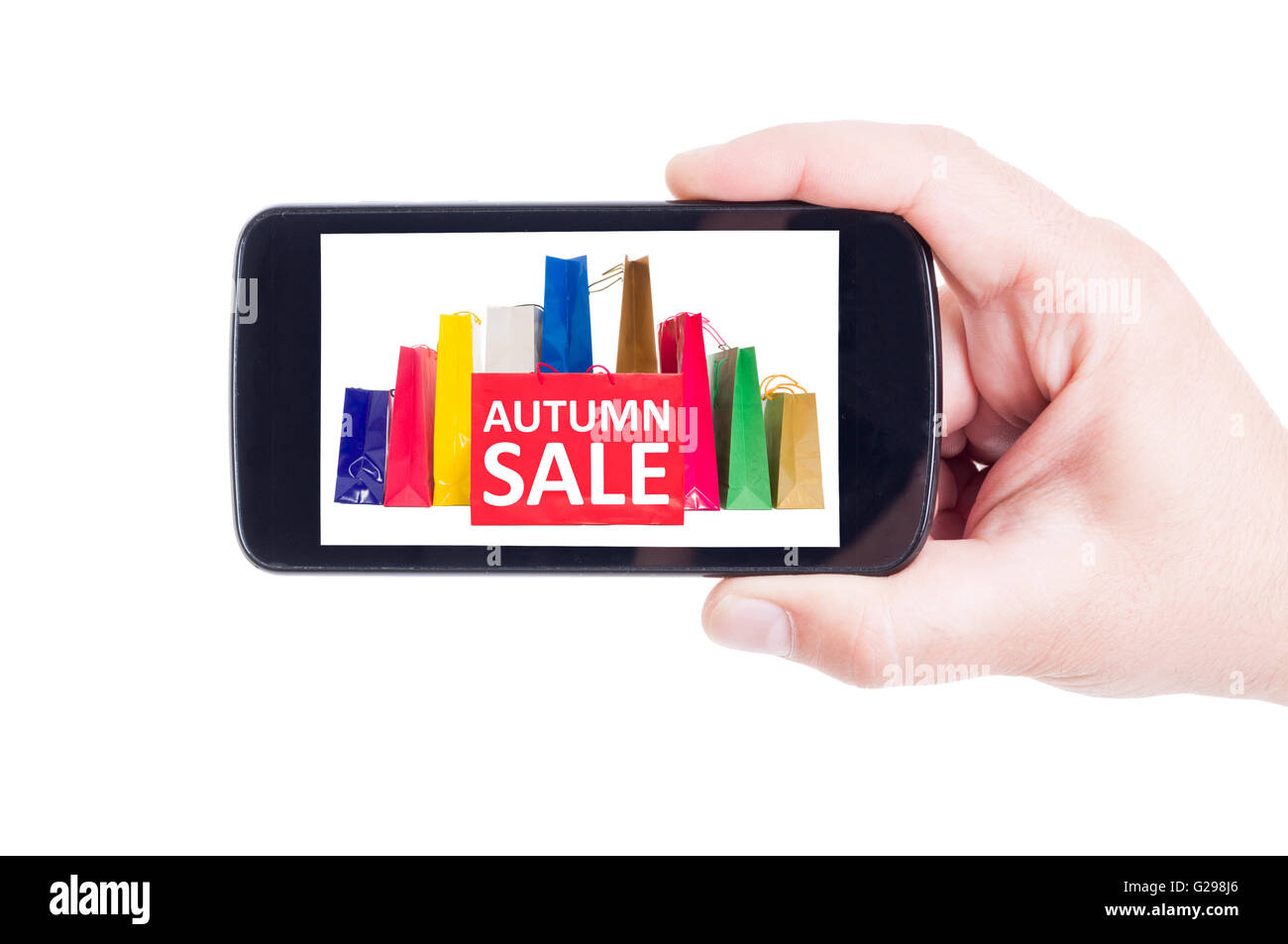 Autumn sale for online shopping using smartphone or wireless mobile device concept Stock Photo