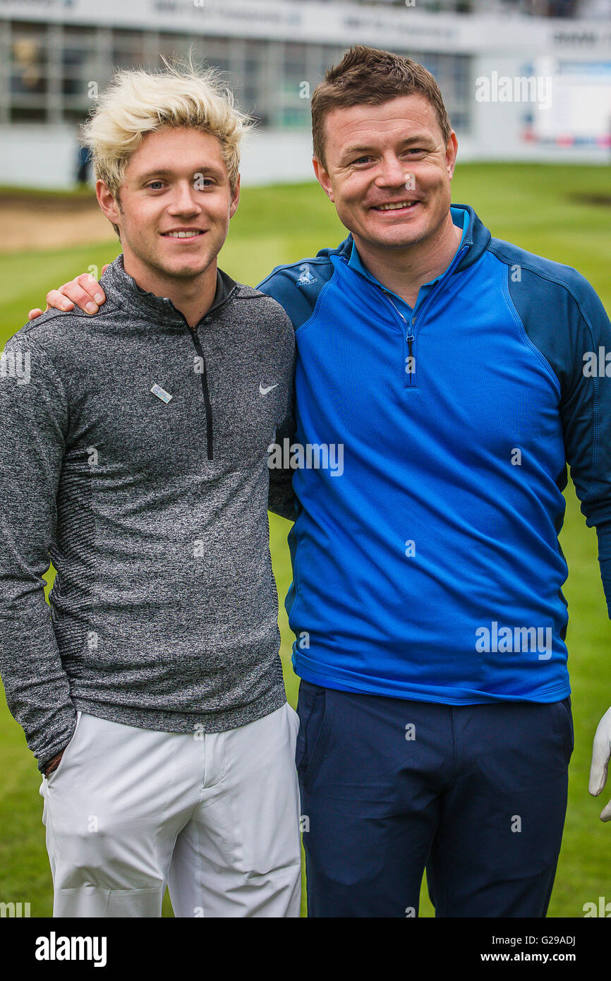 Wentworth, UK. 25th May, 2016. One Direction Star Niall Horan and Irish Rugby Legend Brian O'Driscoll on the 18th after playing in the Wentworth PGA Pro Am Credit:  David Betteridge/Alamy Live News Stock Photo
