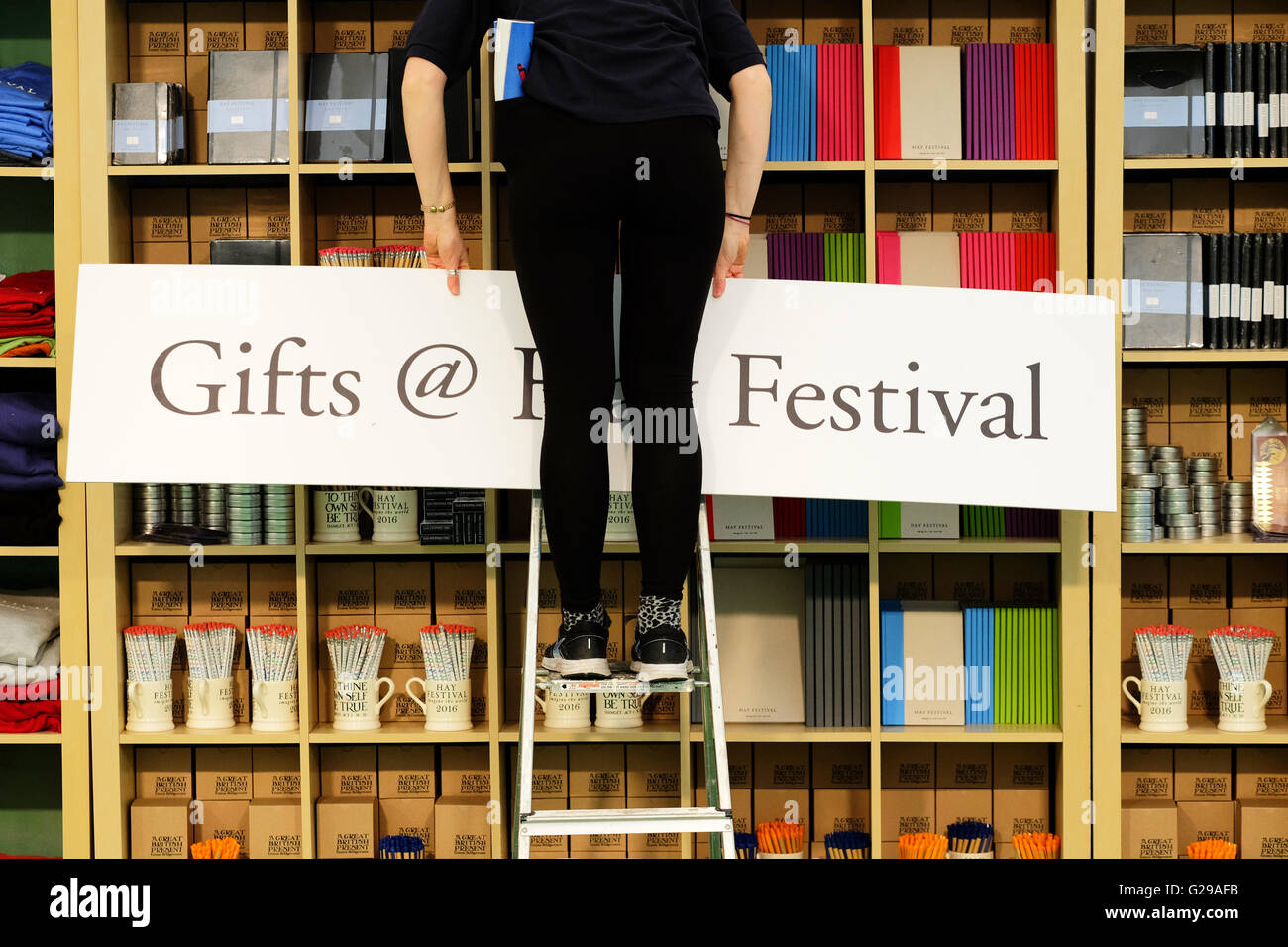 Hay on Wye, Wales, UK. 26th May, 2016.  Opening day for this years literary and arts festival which runs until June 5th. Festival staff make last minute adjustments to the festival bookshop before the public arrive on site. Stock Photo