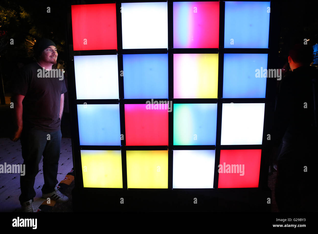 Sydney, Australia. 26 May 2016. Vivid Sydney, the world’s largest festival of light, music and ideas runs for 23 nights from 27 May-18 June 2016. Pictured: Mondrian Cube (AUS): Mondrian Cube reinterprets the abstract artwork of Dutch painter, Piet Mondrian, into a dynamic, interactive installation that enables users to change core visual elements into their own masterpieces of pattern, colour and balance. Credit:  Richard Milnes/Alamy Live News Stock Photo