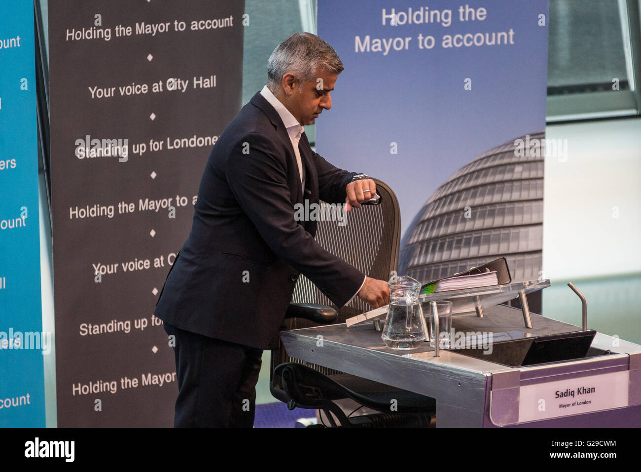 London, UK. 25th May, 2016. Sadiq Khan checks his wristwatch as he arrives for his first Mayor’s Question Time at City Hall as Mayor of London. Credit:  Mark Kerrison/Alamy Live News Stock Photo