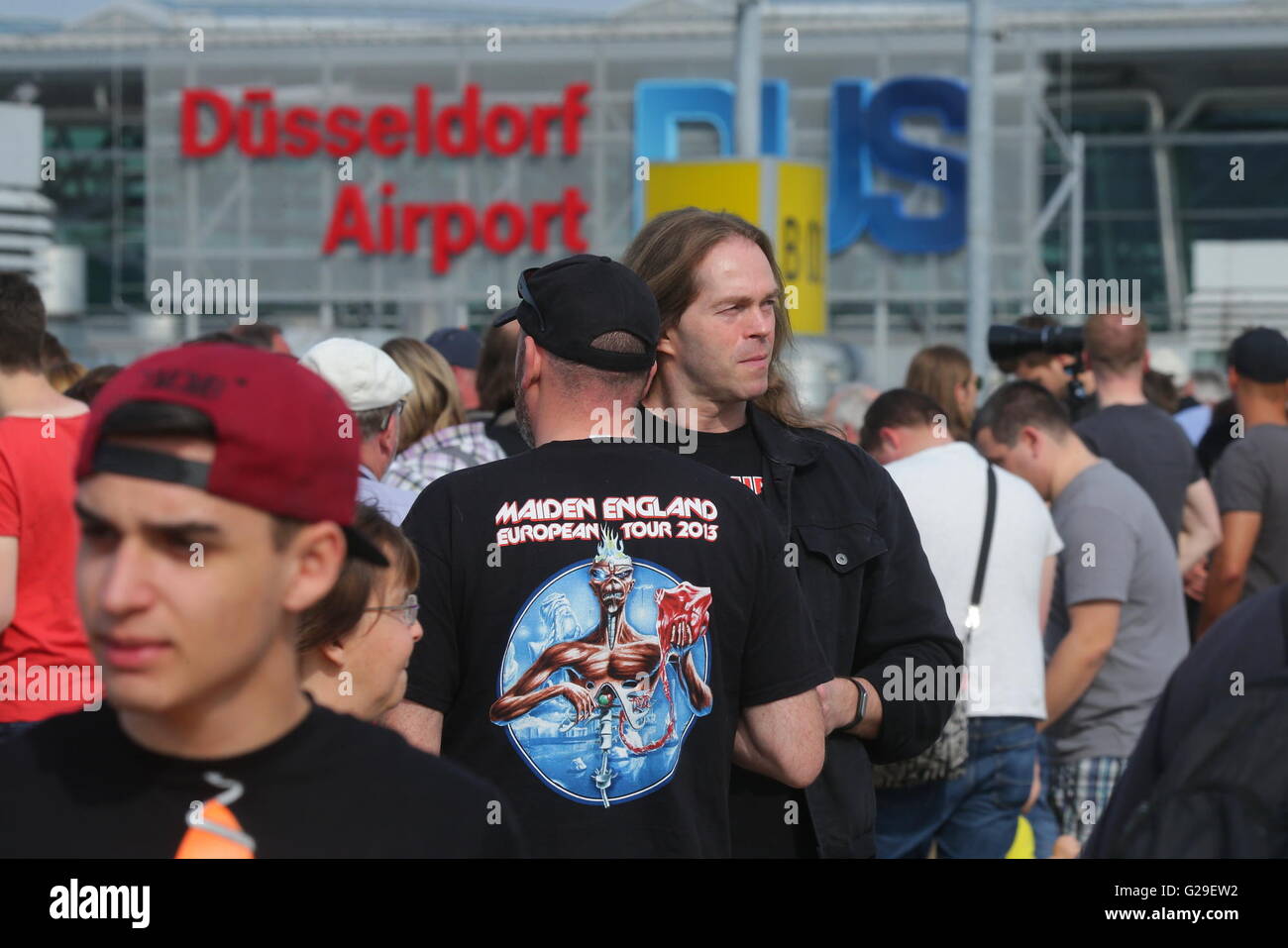Duesseldorf, Germany. 26th May, 2016. Fans of the heavy metal band Iron Maiden wait for the arrival of the band's private plane at the airport in Duesseldorf, Germany, 26 May 2016. The band is performing at the festival 'Rock im Revier.' Photo: DAVID YOUNG/dpa/Alamy Live News Stock Photo