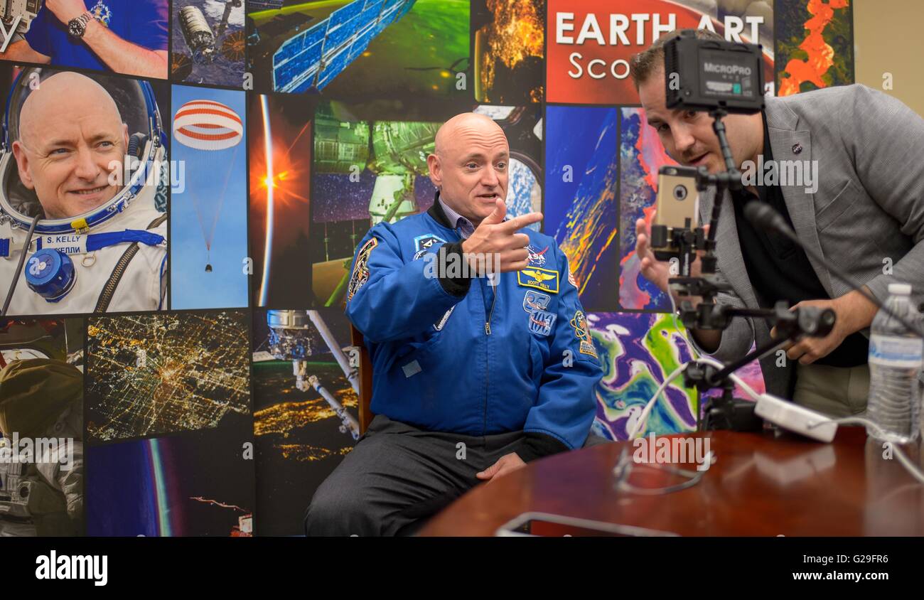 Former NASA astronaut Scott Kelly speaks during a social media online event from the Rayburn House Office Building on Capitol Hill May 25, 2016 in Washington, DC. Kelly is the first American to spend 1-year in space aboard the International Space Station. Stock Photo