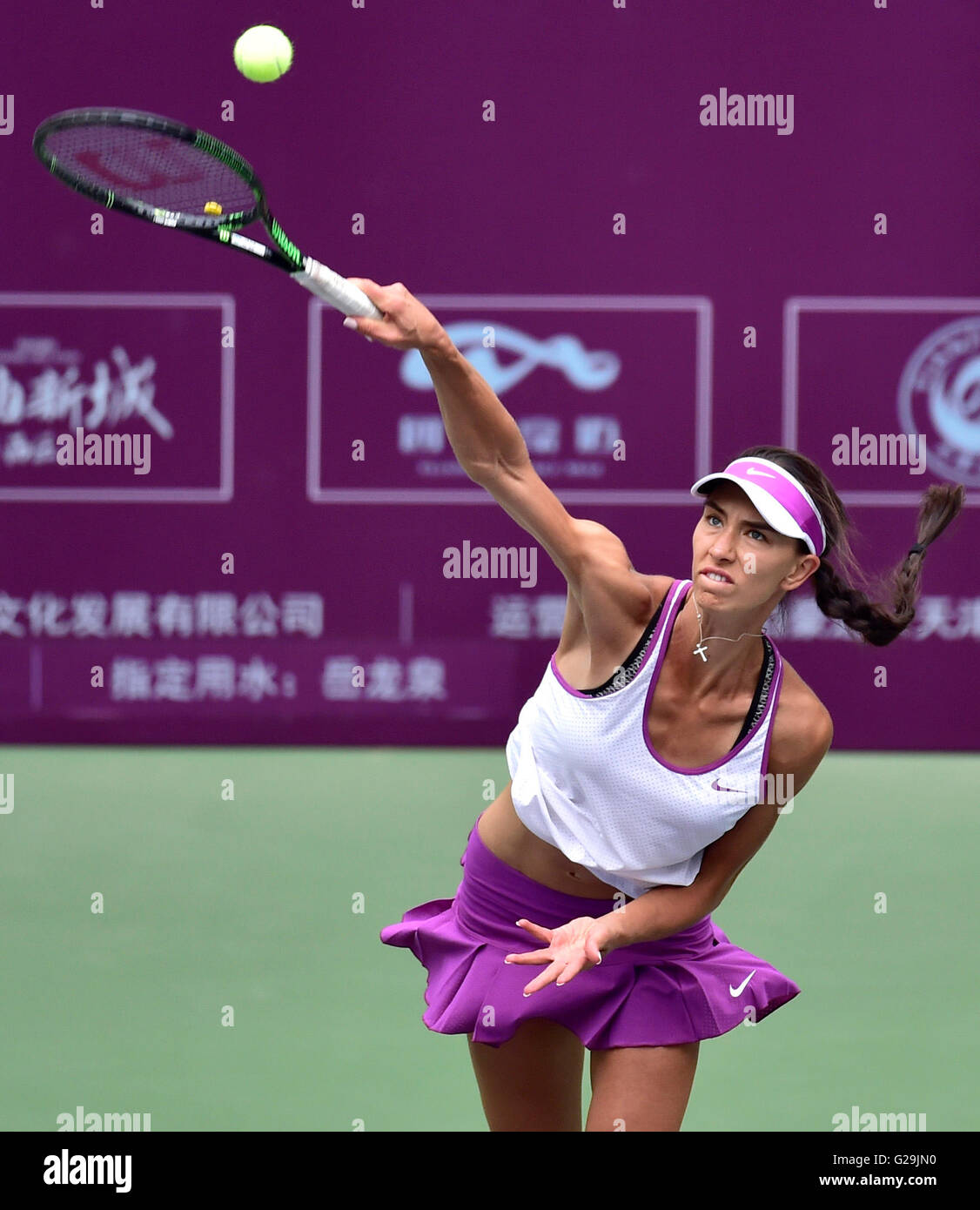 Tianjin. 27th May, 2016. Anastasia Pivovarova of Russia serves during the singles' quarterfinal against Liu Fangzhou of China in 2016 ITF Women's Circuit in north China's Tianjin Municipality, on May 27, 2016. Anastasia Pivovarova retired in the second set. Credit:  Yue Yuewei/Xinhua/Alamy Live News Stock Photo