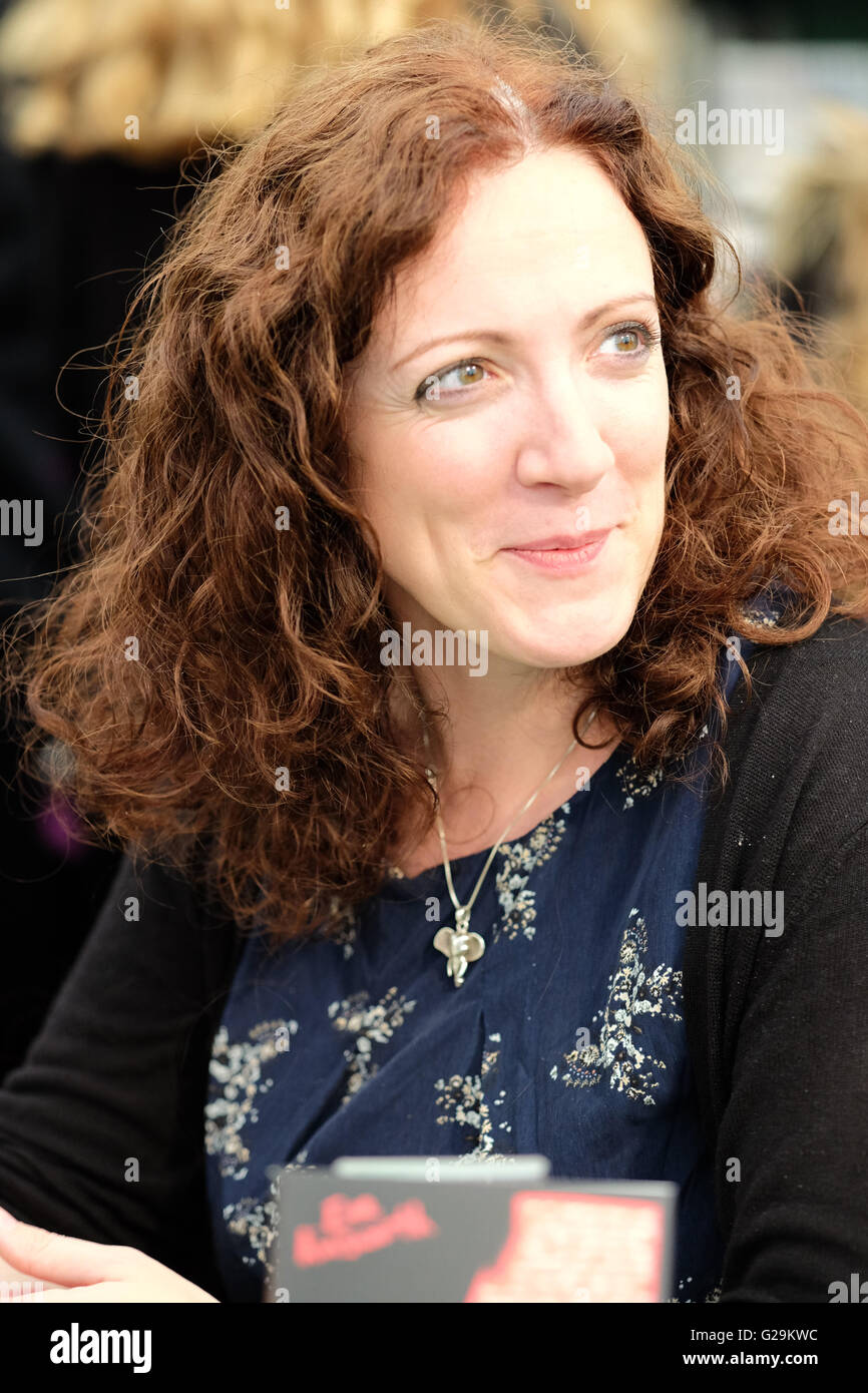 Female childrens author book signing hires stock photography and