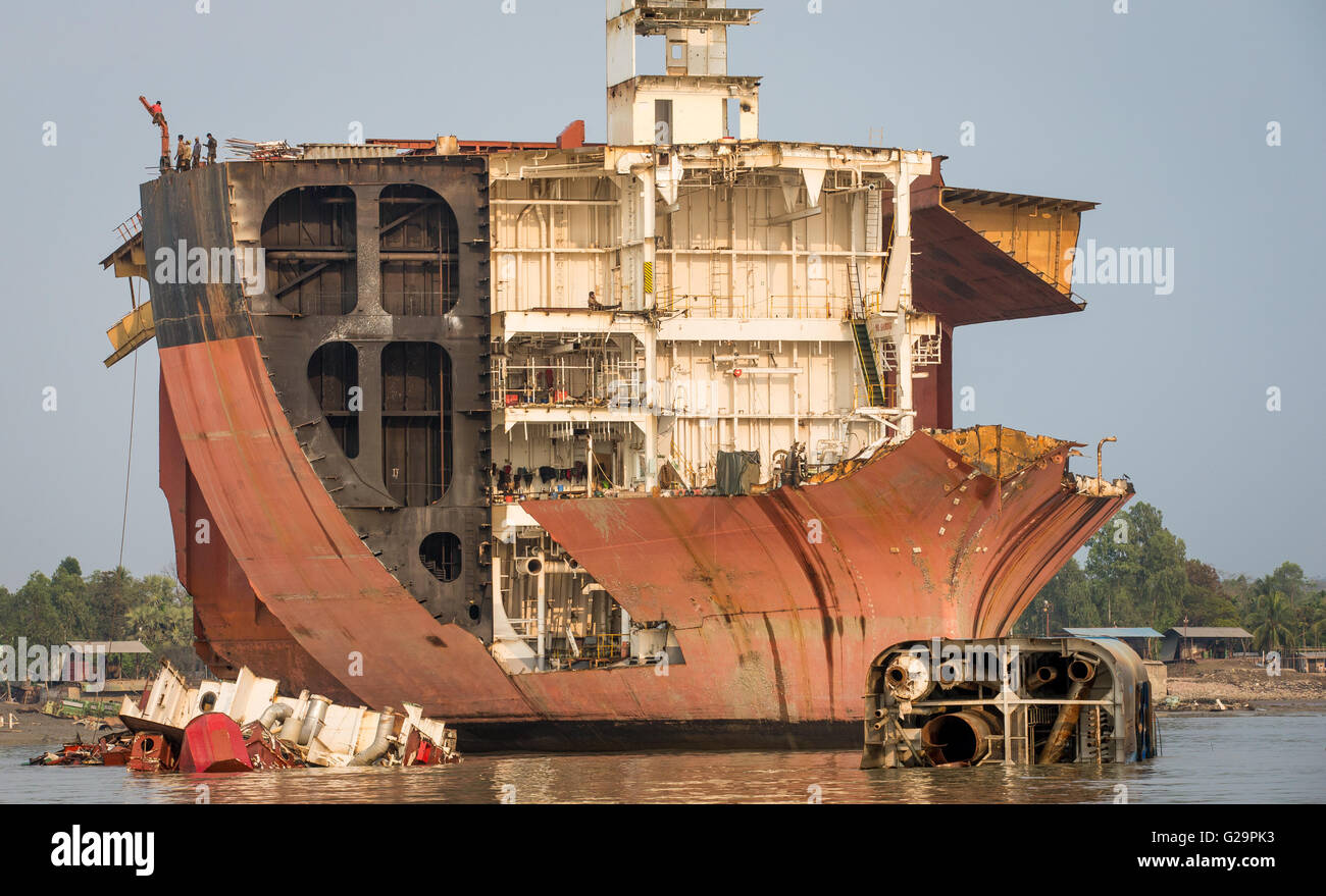 Partially broken down ocean ship in a ship breaking yard in Chittagong, Bangladesh Stock Photo