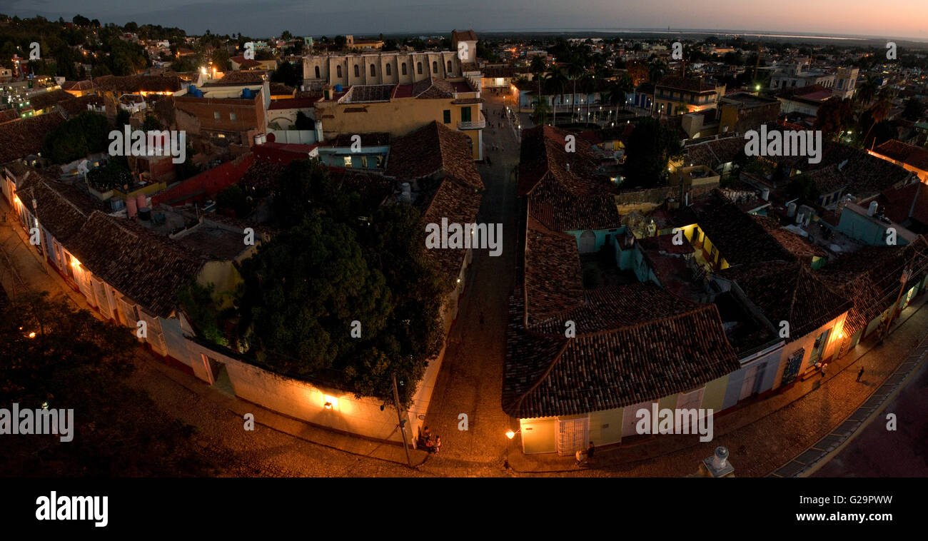 A 3 picture stitch panoramic view over Trinidad at sunset evening taken from the Convent de San Francisco de Asís bell tower. Stock Photo