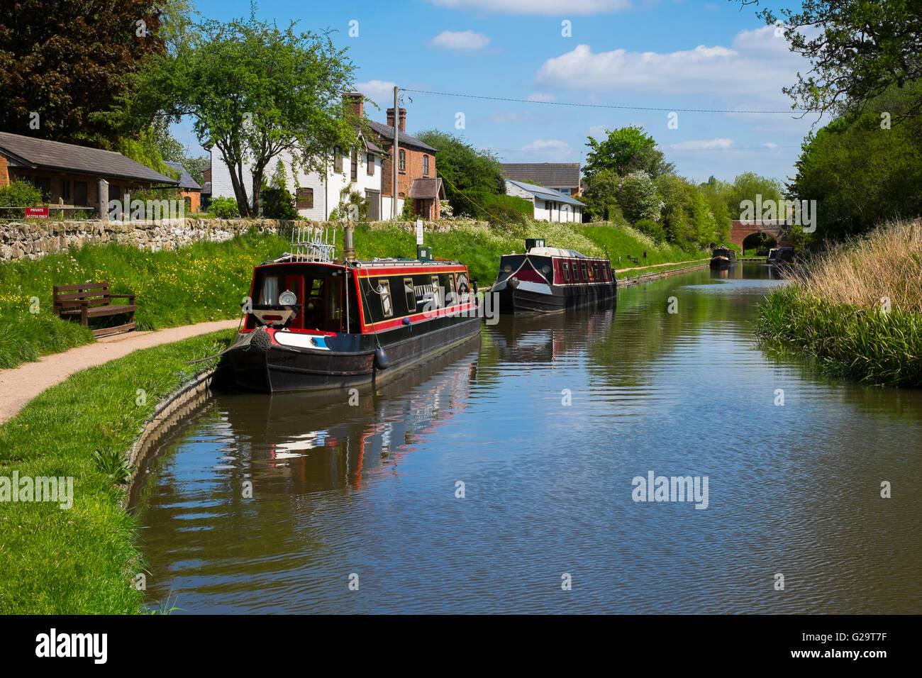 Canal boats moored on the Whitchurch arm of the Llangollen Canal, Shropshire, England, UK Stock