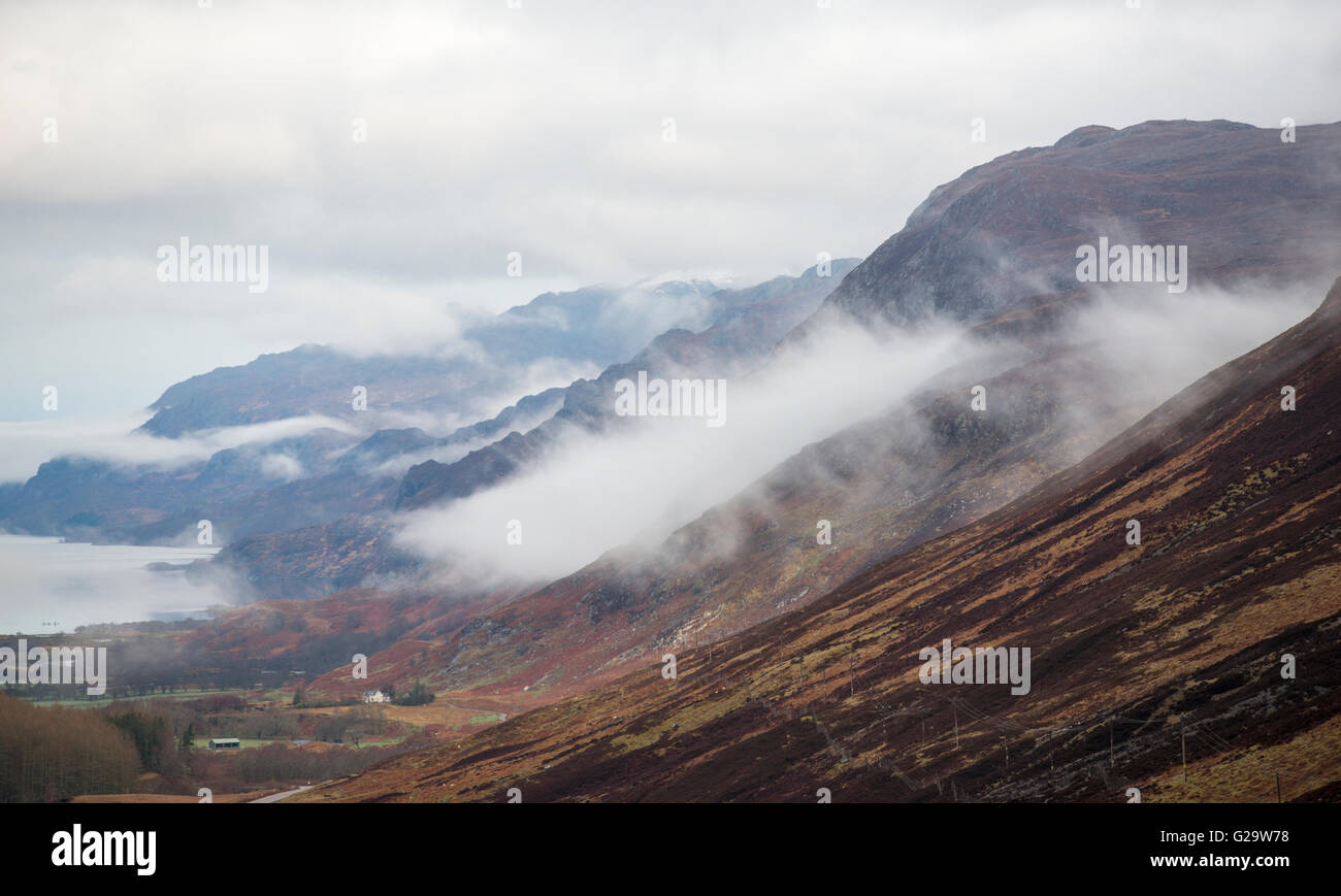 Morning mist in the valley at Glen Docherty, between Kinlochewe and Loch Maree in Wester Ross, Scotland UK Stock Photo