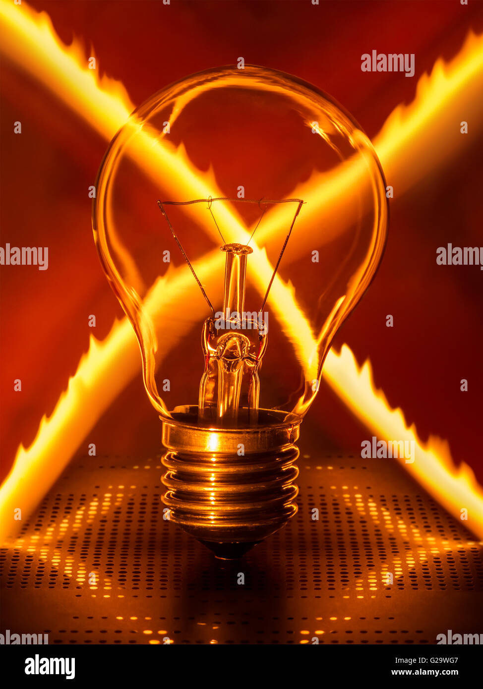 Light bulb with crossed fire trail Stock Photo