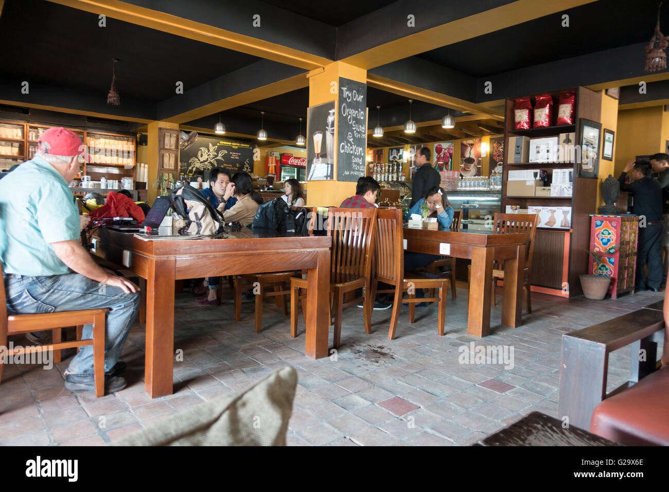 People sitting in Himalayan Java Coffee Shop, Thamel District, Kathmandu, Nepal Stock Photo