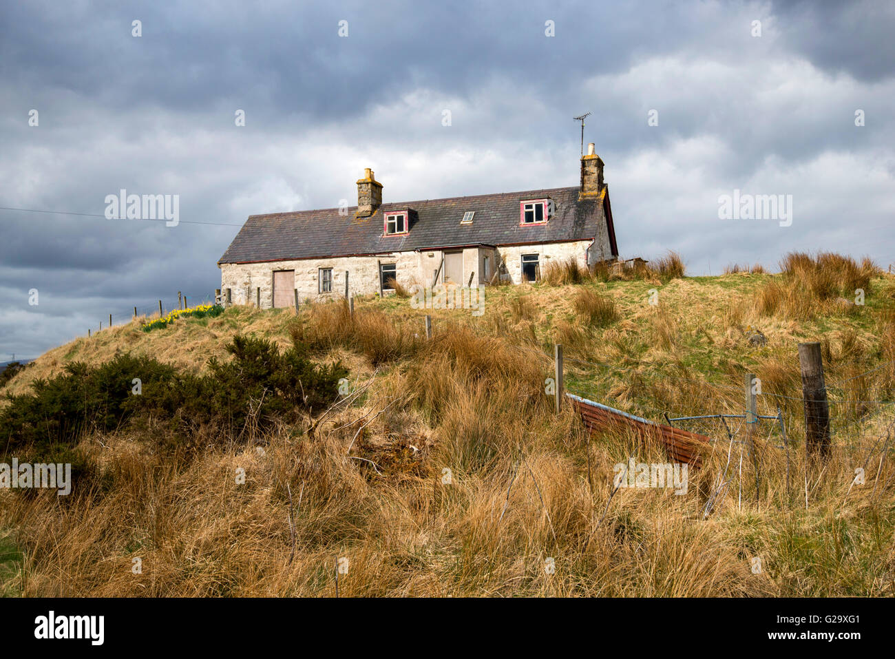 Deserted crofters cottage on the A838 by Loch Shin in Sutherland Scotland UK Stock Photo