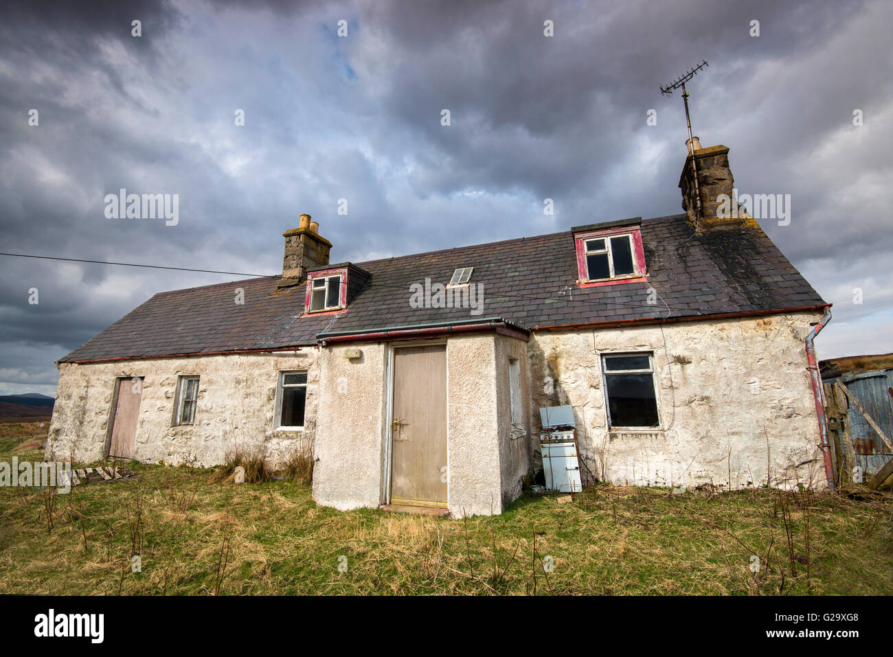 Deserted crofters cottage on the A838 by Loch Shin in Sutherland Scotland UK Stock Photo