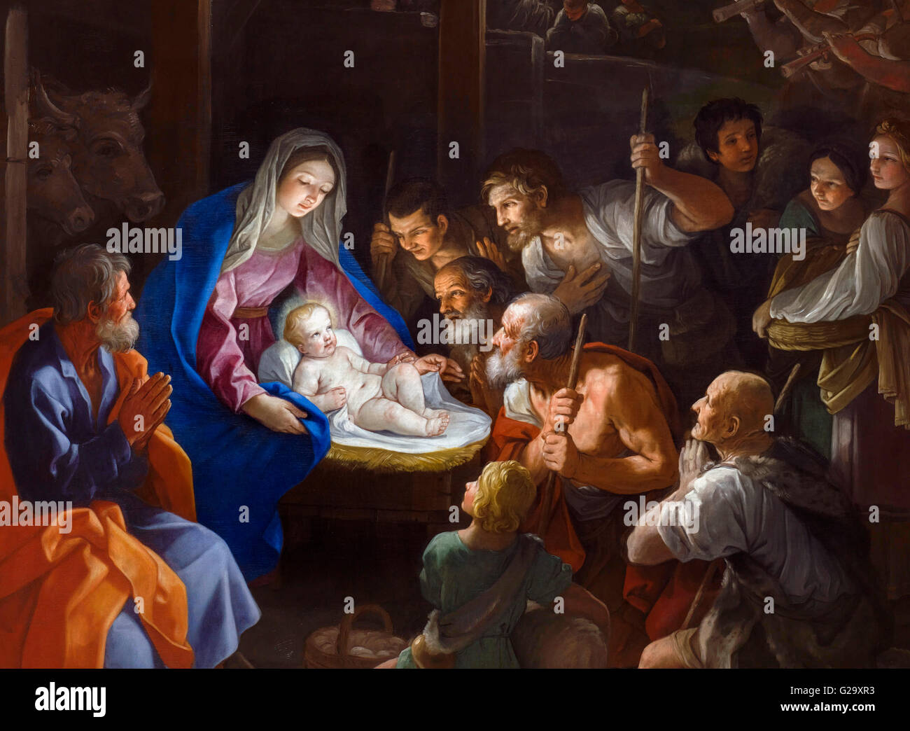 Nativity painting.'The Adoration of the Shepherds' by Guido Reni (1575-1642), oil on canvas, 1640. This is a detail from a larger painting, G29XR6. It depicts a nativity scene with the baby Jesus being visited by shepherds. Stock Photo