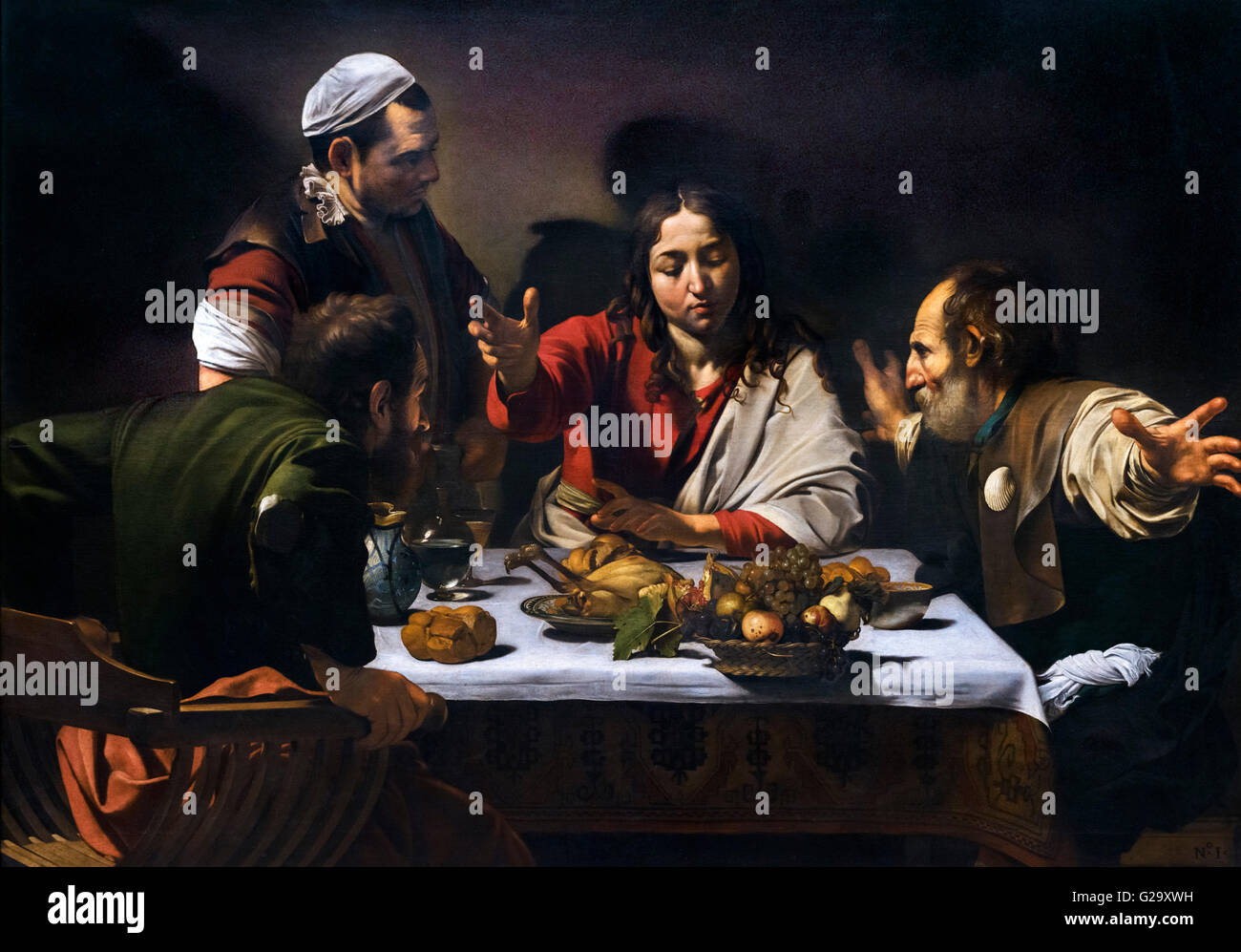 Supper at Emmaus by  Caravaggio (1571-1610), oil on canvas, 1601. Stock Photo