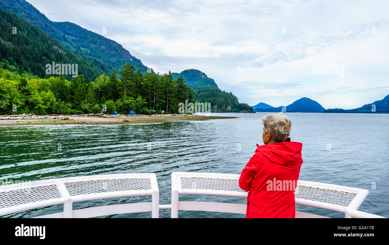 Senior women enjoying the view of Howe Sound, a fjord that runs from Vancouver  to the town of Squamish Stock Photo