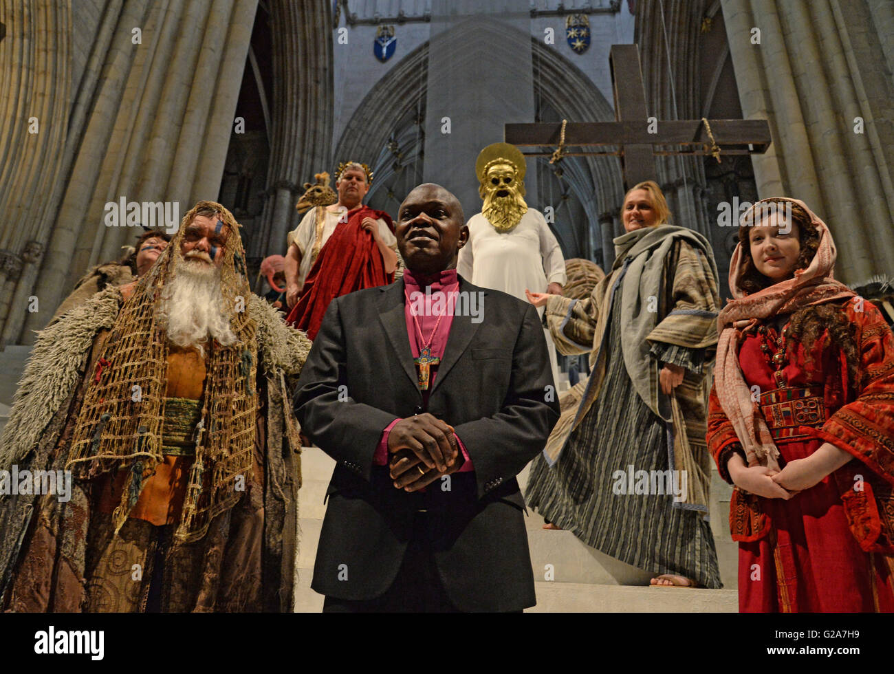 The Archbishop of York, Dr John Sentamu (centre), with cast and crew members, ahead of the opening night of the York Minster Mystery Plays as the cathedral will be transformed into a 1,000 seater auditorium. Stock Photo