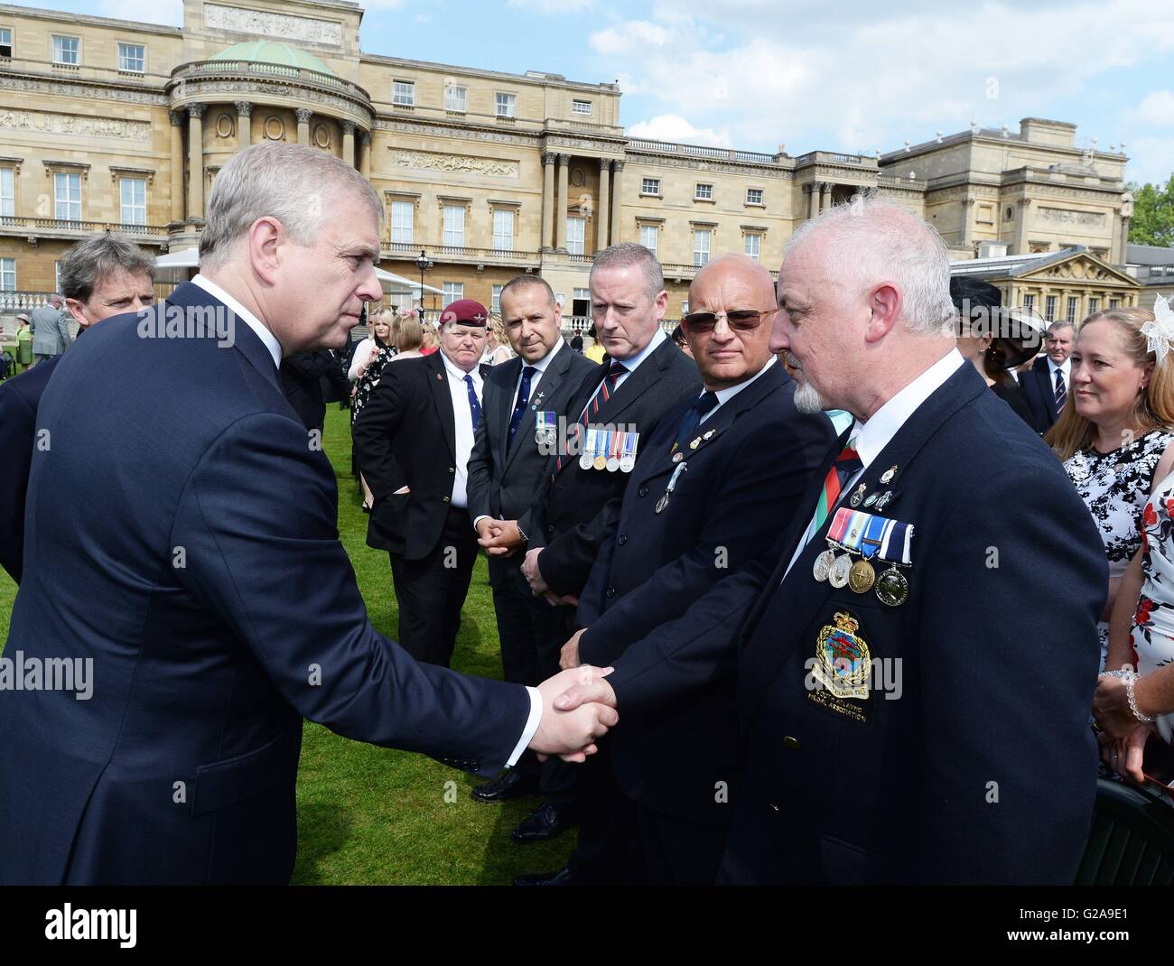 The Duke of York talks to guests as he hosts the annual Not Forgotten Association Garden Party, accompanied by Princess Beatrice and Princess Eugenie at Buckingham Palace, London. Stock Photo