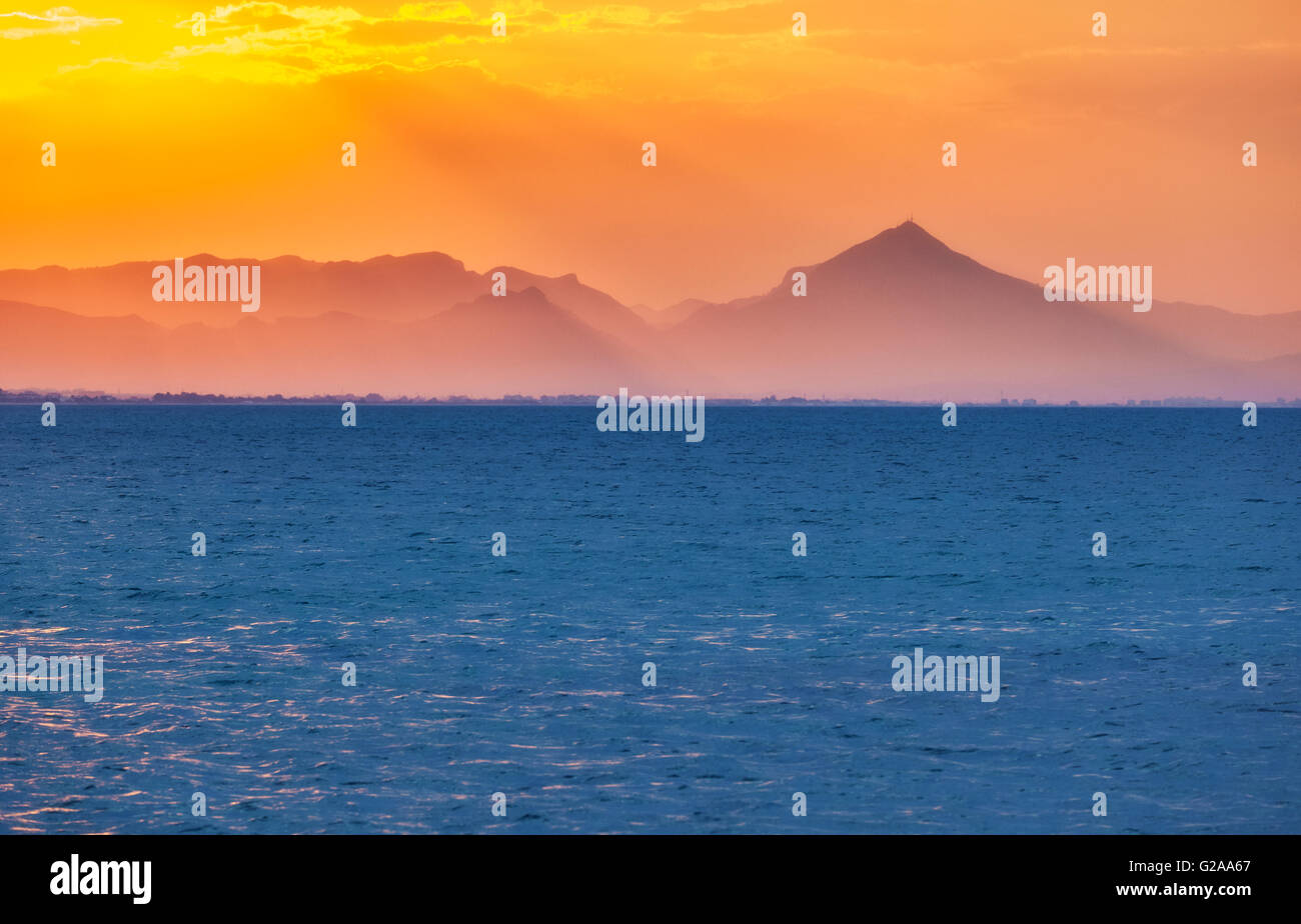 Sunset at the Mediterranean sea. Denia Alicante. Valencia Community. Spain. Stock Photo