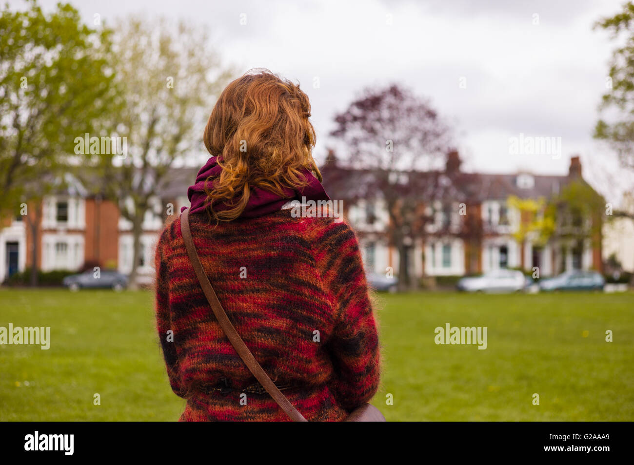 Woman alone walking park happy hi-res stock photography and images - Alamy
