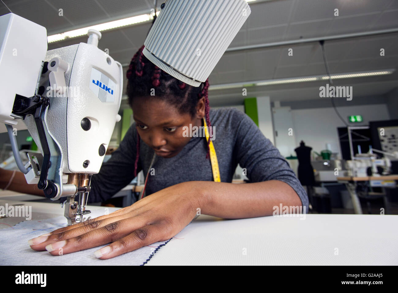 Practical lessons on the sewing machine for budding seamstresses Stock  Photo - Alamy