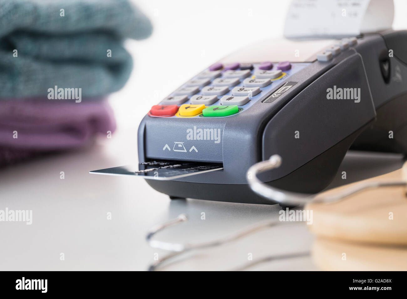 Credit card reader on counter Stock Photo