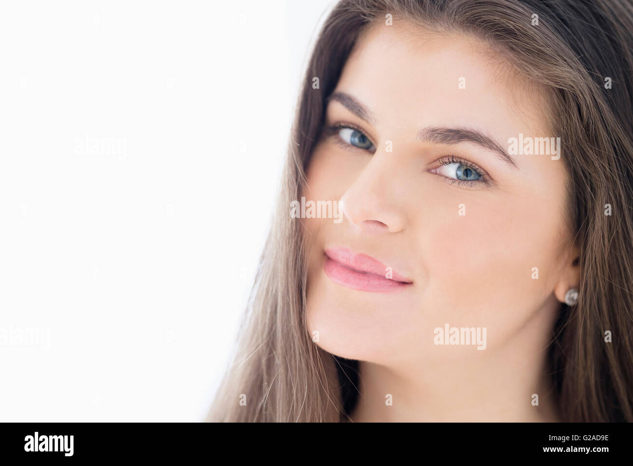 Portrait of young woman with brown hair Stock Photo - Alamy
