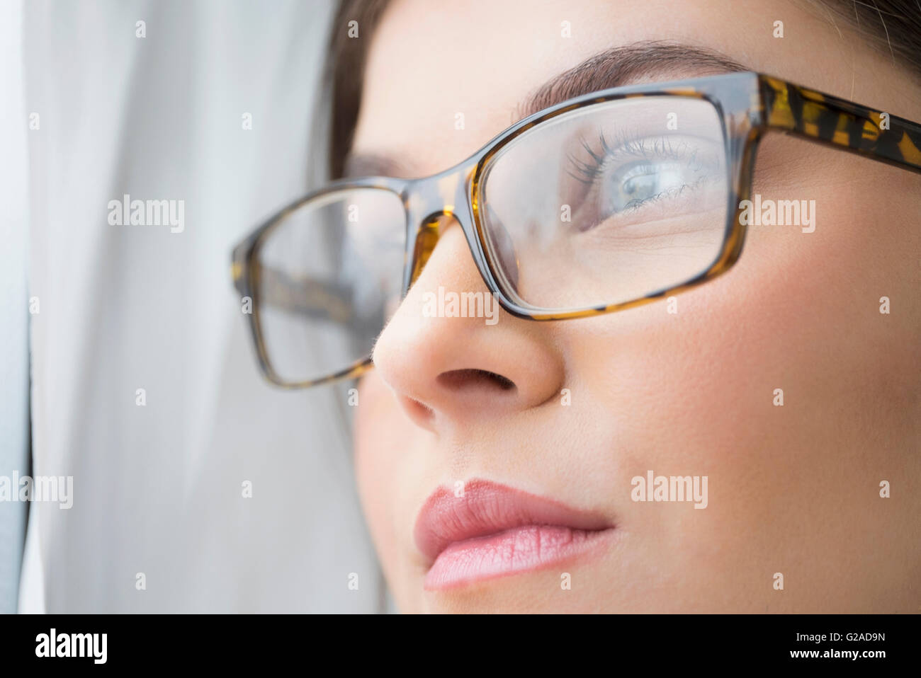Blue eyes close up with glasses hi-res stock photography and images - Alamy