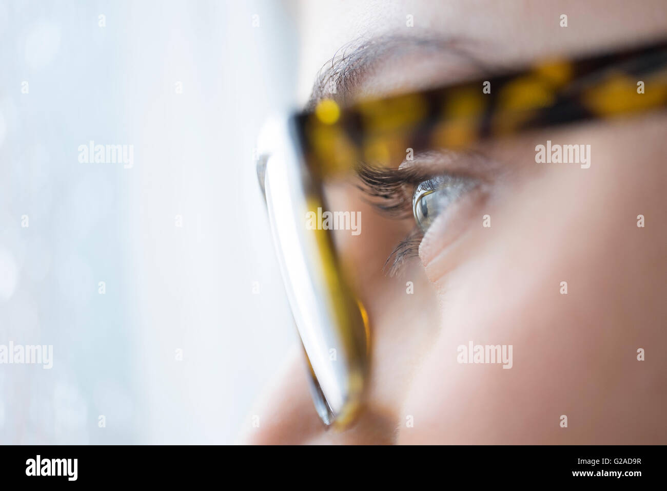 Blue eyes close up with glasses hi-res stock photography and images - Alamy